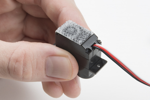 Adhesive on servo