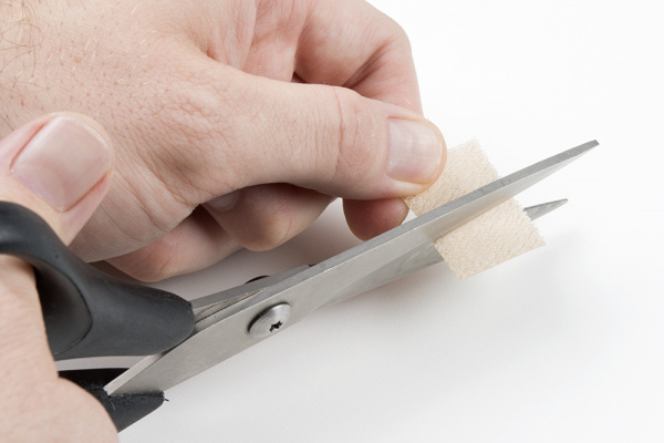 Dual Lock tape being cut